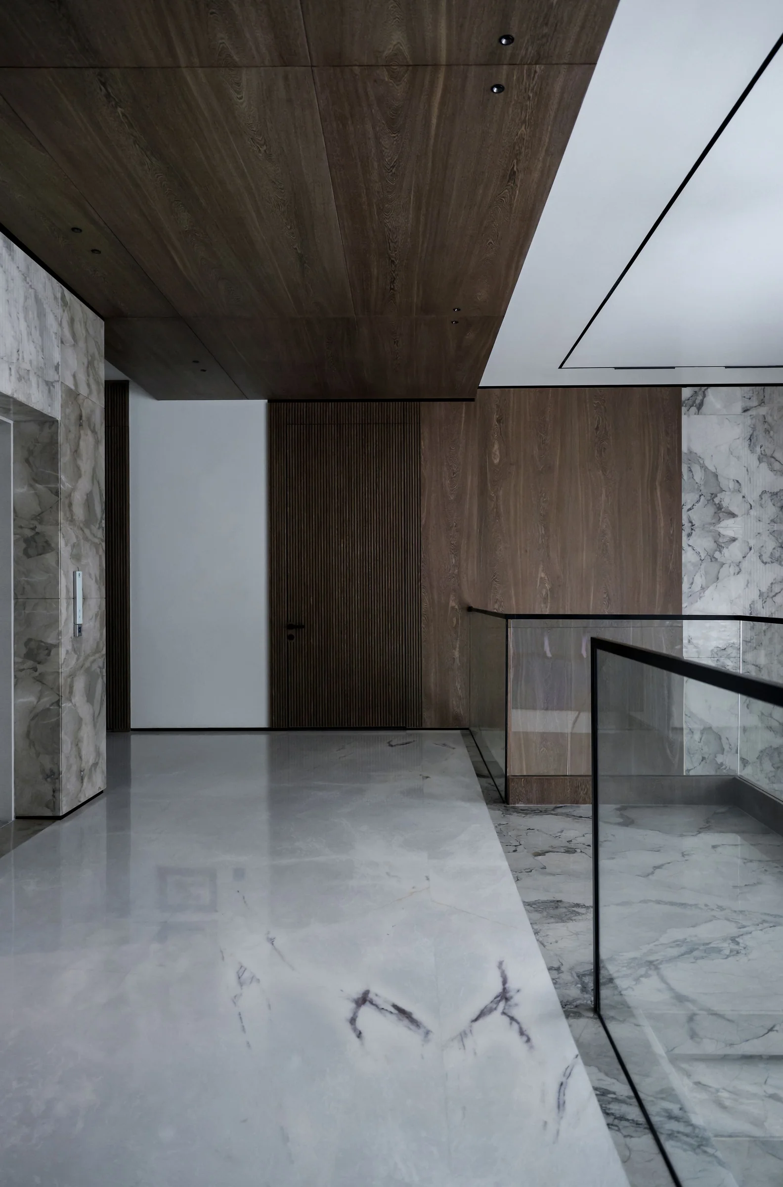 Marble and wood interior representing coordinated furniture and material decisions during Foshan supplier follow-up