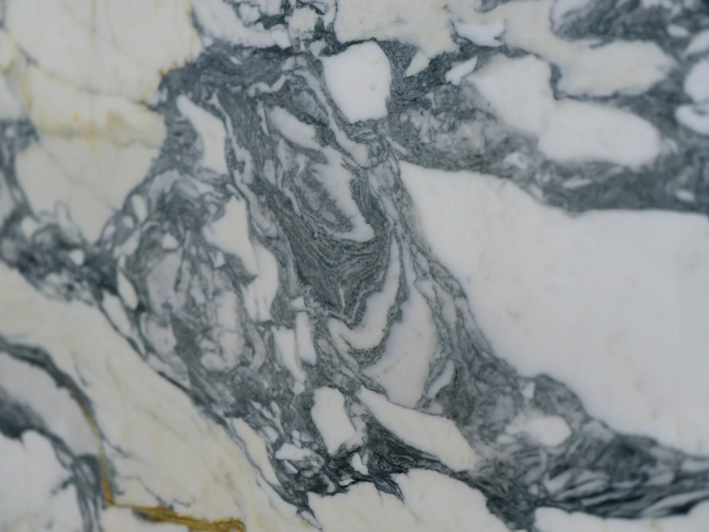 Grey and gold marble slab reviewed as an example of building material selection for Canton Fair follow-up