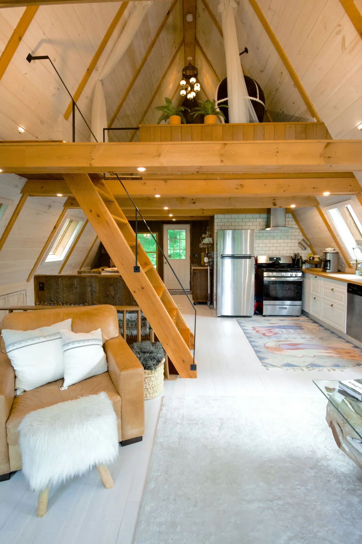 Custom timber staircase integrated into a contemporary loft interior