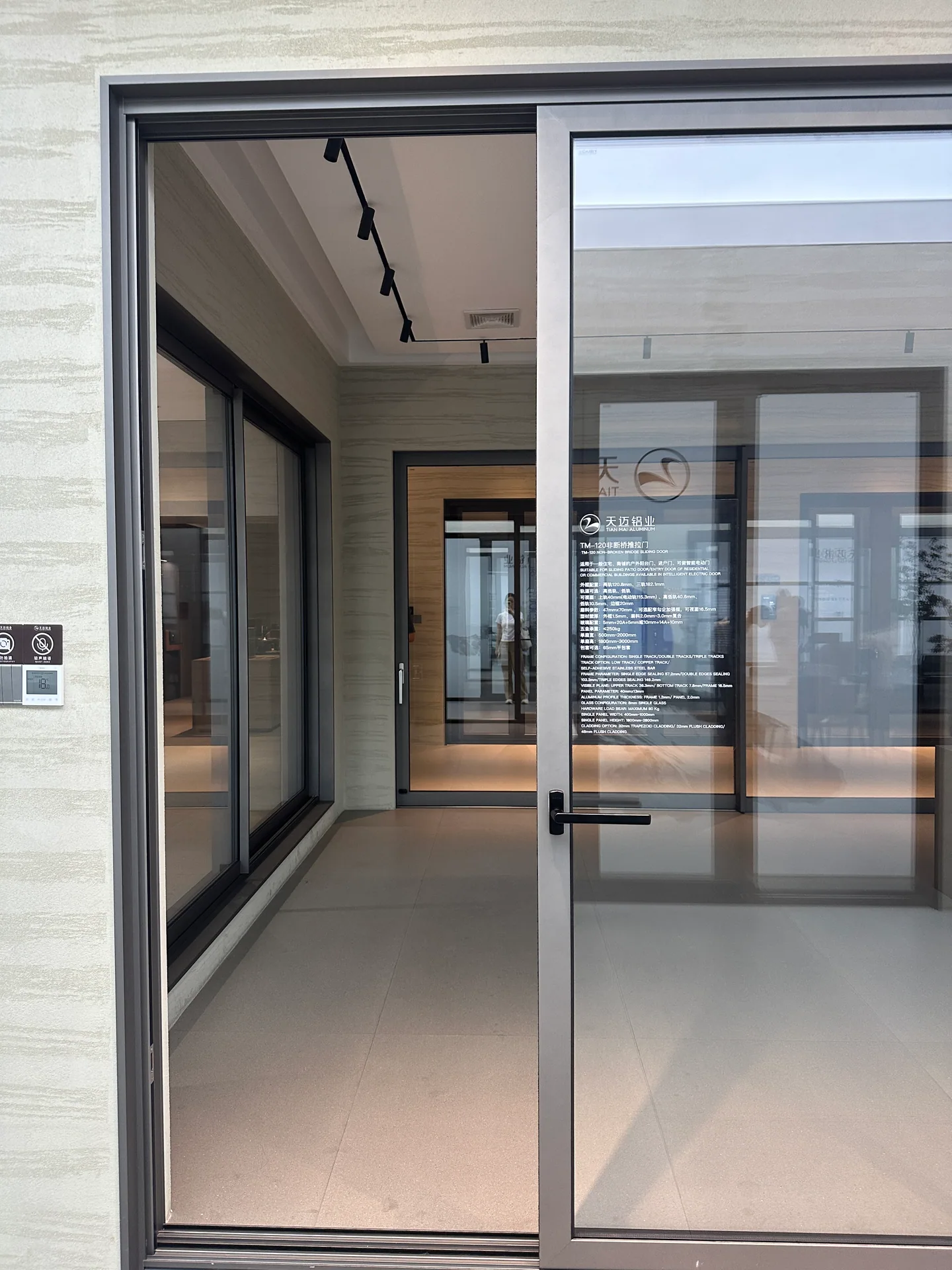 Custom aluminium door and window systems in a Foshan showroom