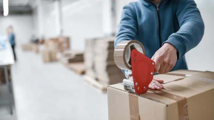 Expert Chinese sourcing agent managing furniture consolidation in a Foshan warehouse. We provide secure export packing for Foshan building materials and china furniture to ensure safe international shipping for global projects.