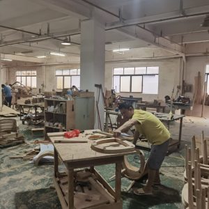 Sourcing agent comparing material samples for high-end interior design projects in Foshan.